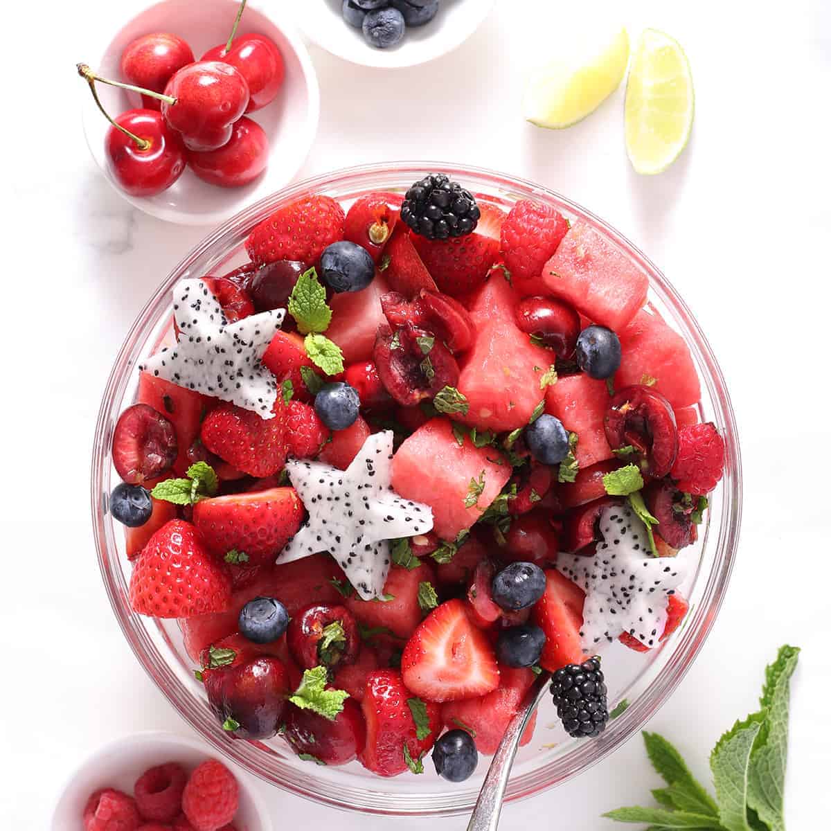 dragon fruit cookie cutter stars on a fruit salad