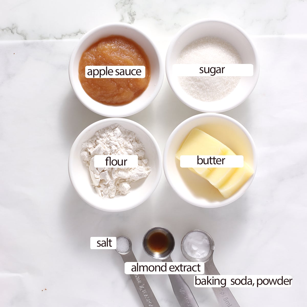 almond sugar cookie ingredients on a table.