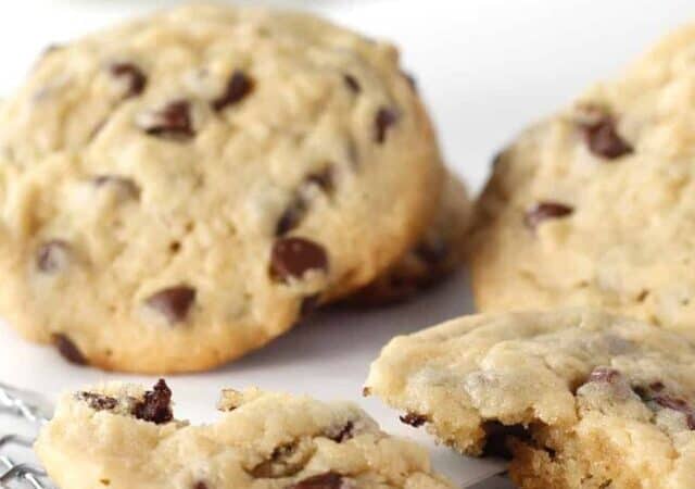 chocolate chip cookies without brown sugar broken on a cooling rack.