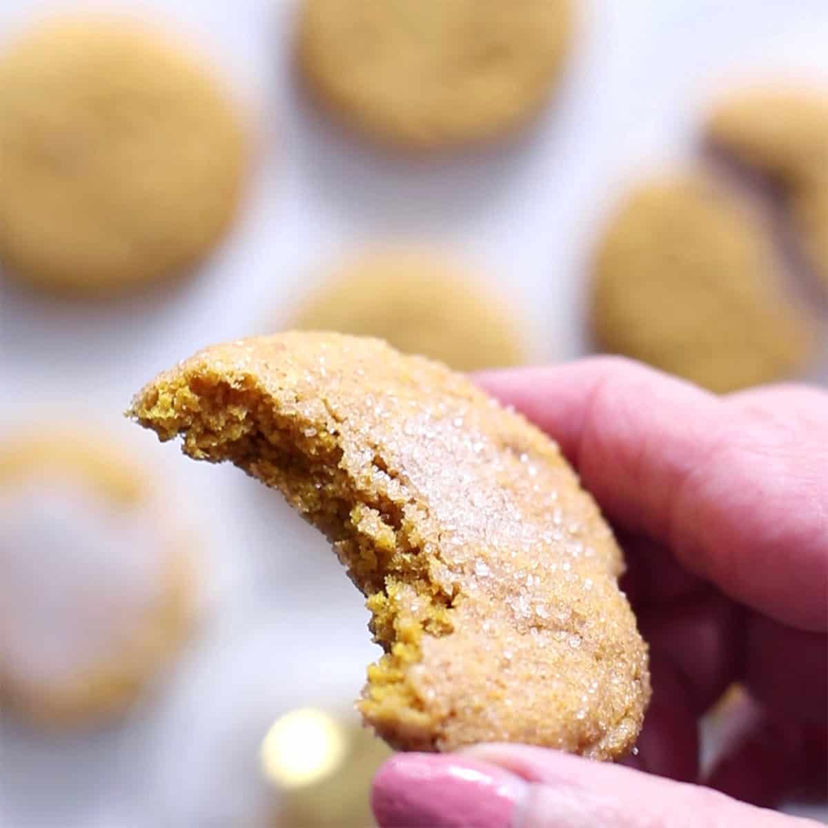 cookies with a bite with a sugar top.