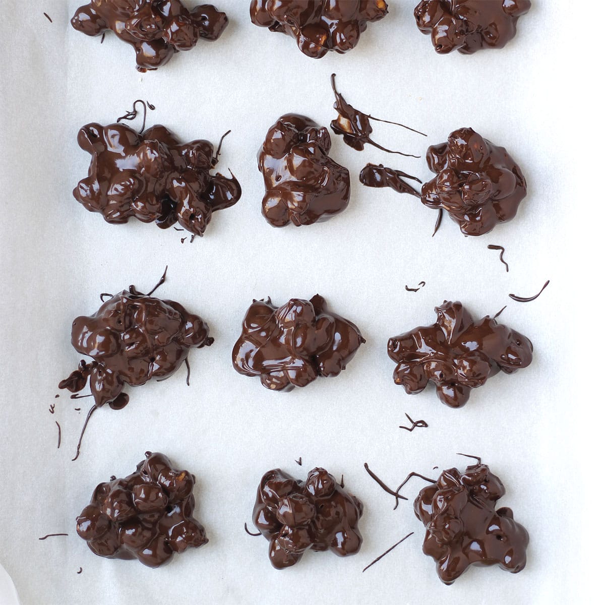 spoonfuls of chocolate covered chickpea clusters.