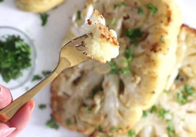 A forkful of cauliflower steak.