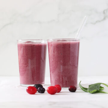 spinach berry smoothie in glasses.