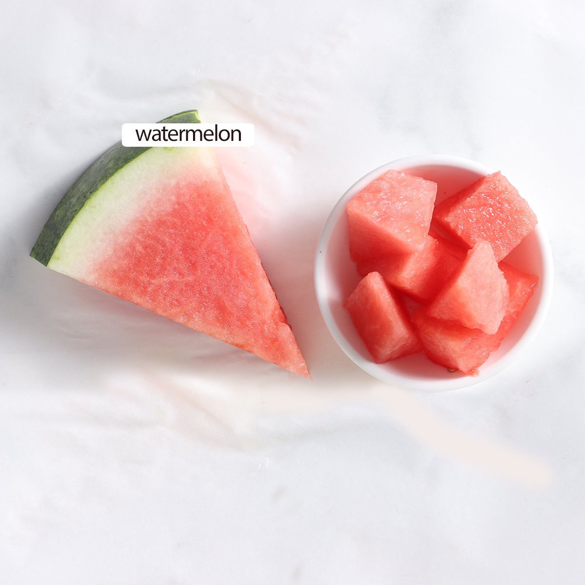 a wedge of watermelon and bricks.