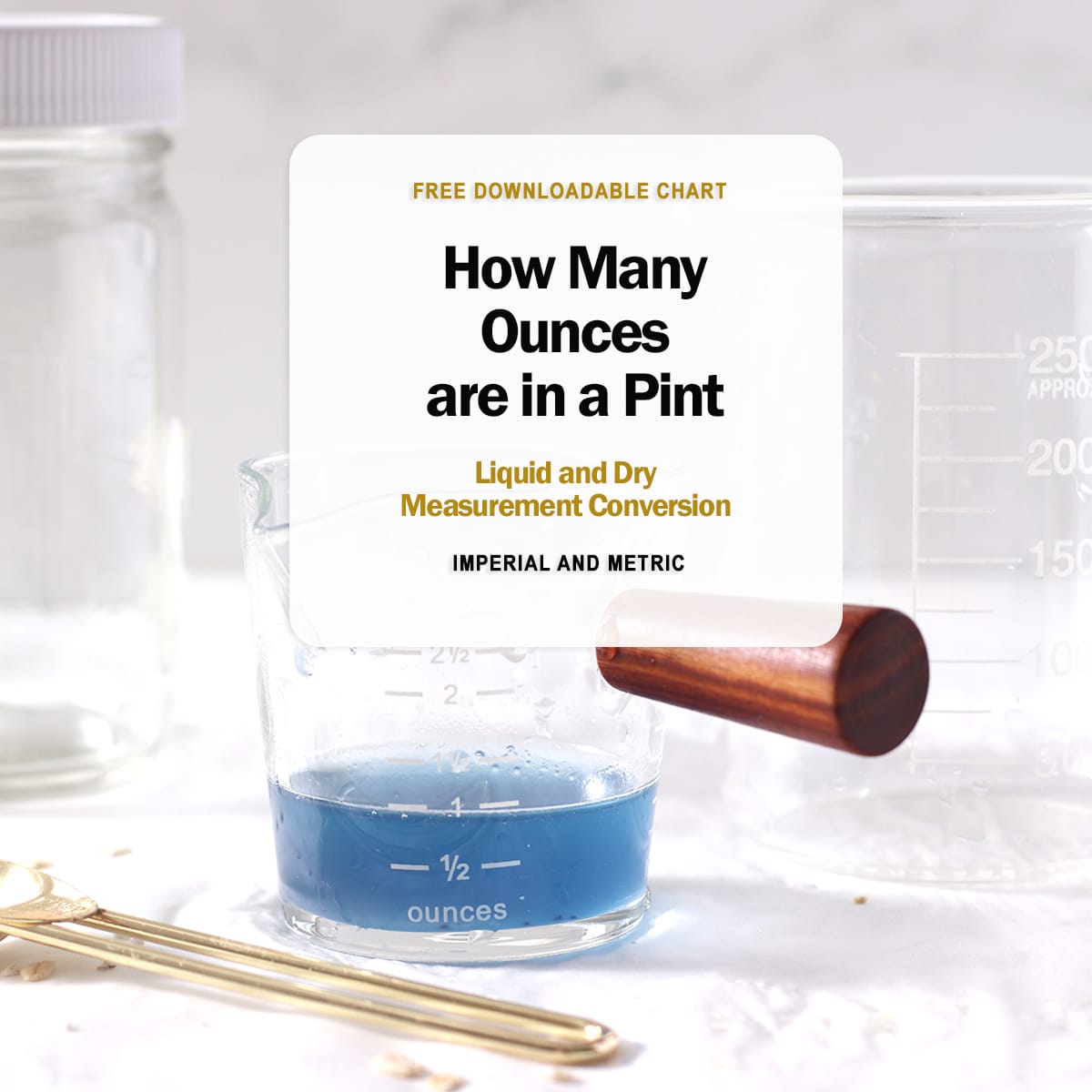 a glass cup with ounces for ounces in a pint guide.
