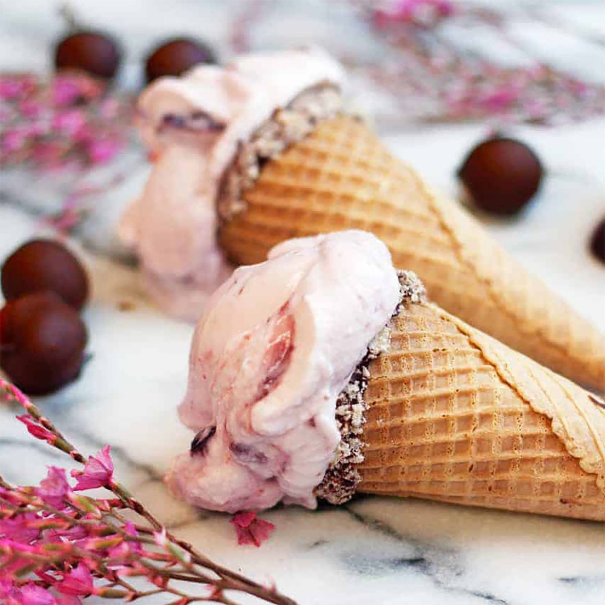 homemade cherry ice cream in cones.