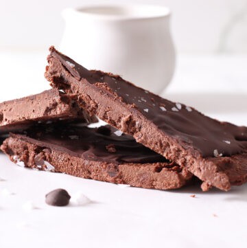 brownie bark sliced on a table.