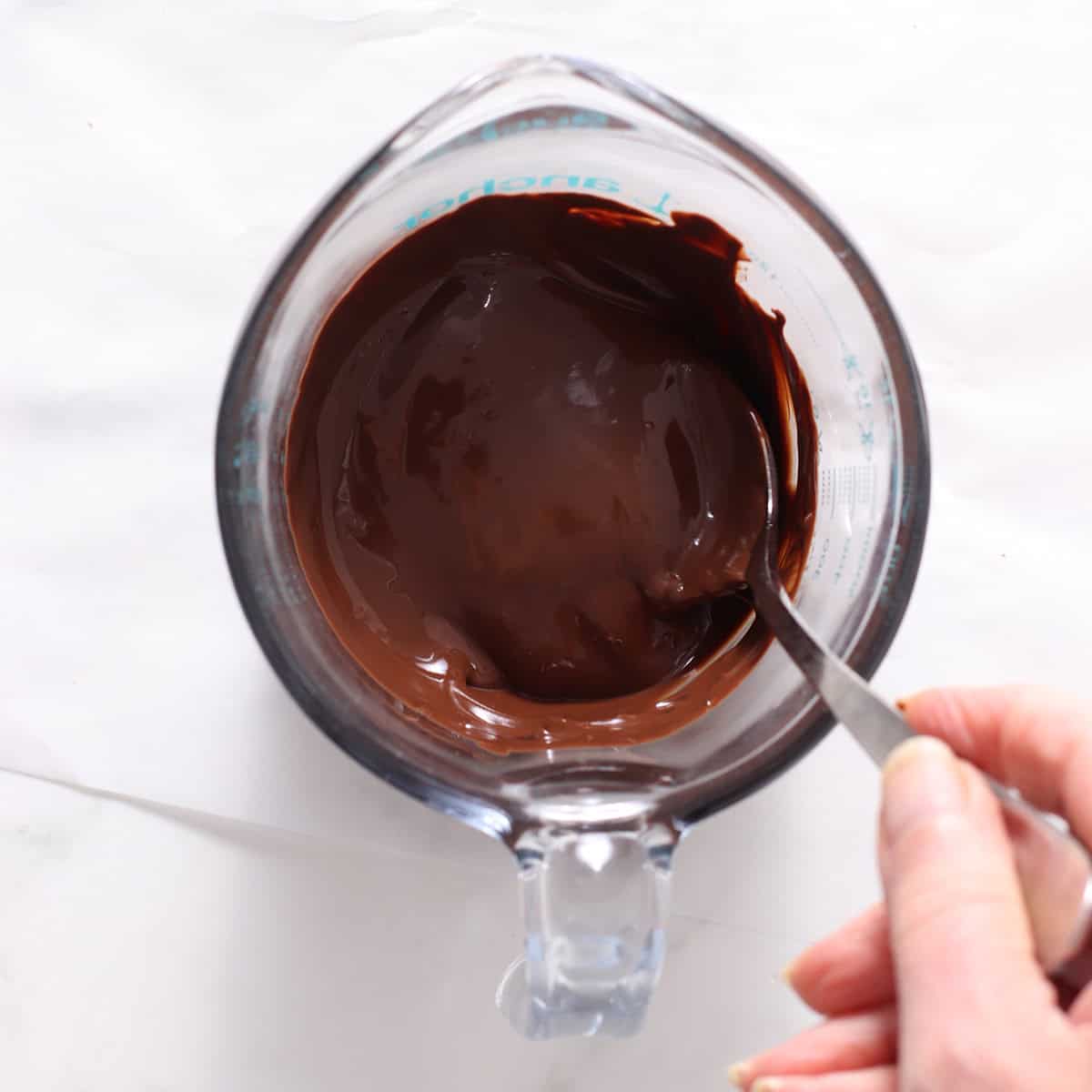 chocolate ganache with milk in a bowl.