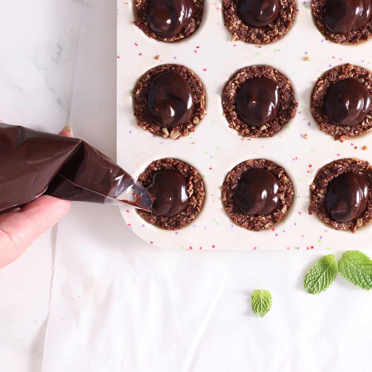 no bake chocolate mint cups filling piped.