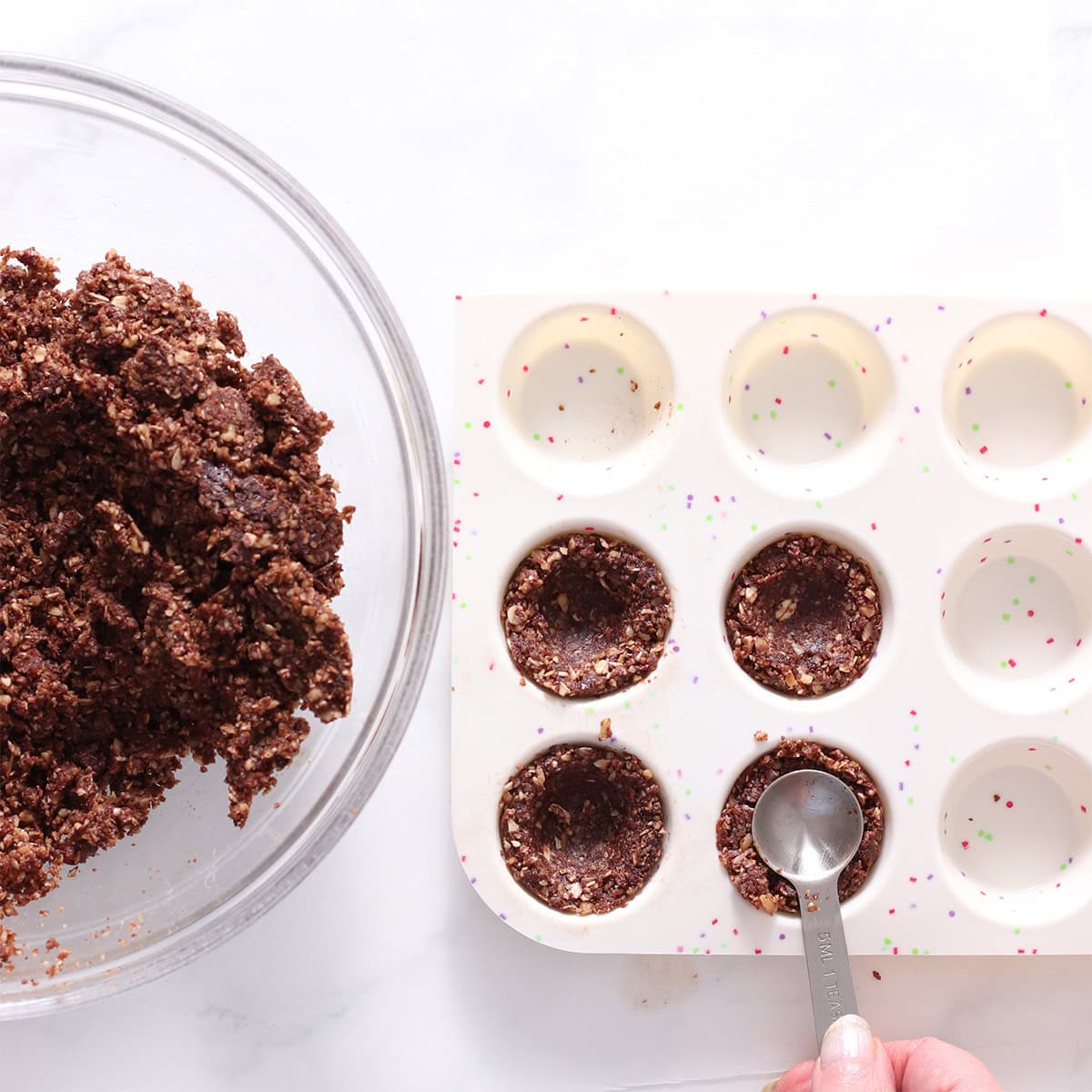 no bake chocolate mint cups crust pressed into a mold.