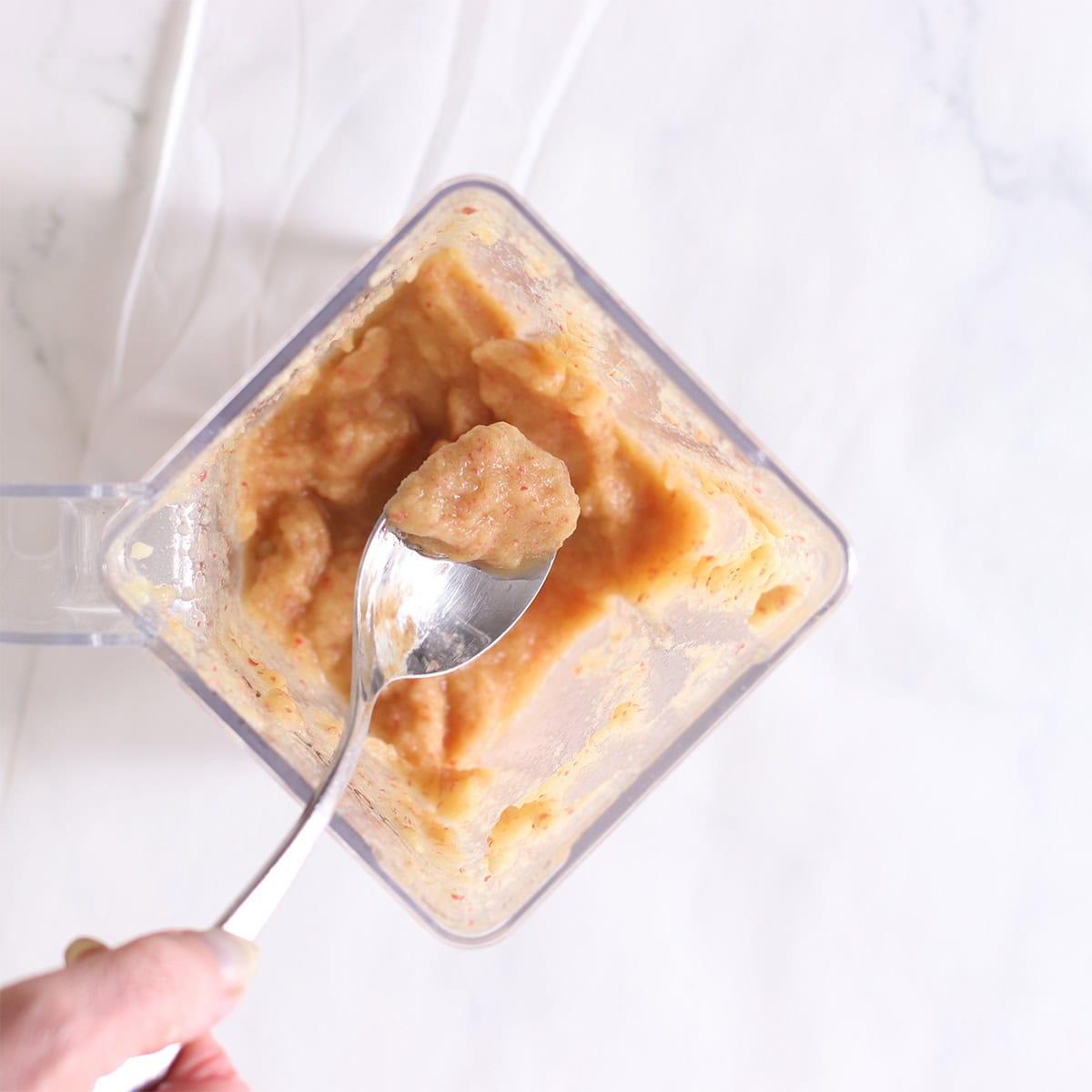 pureed apples in a blender.