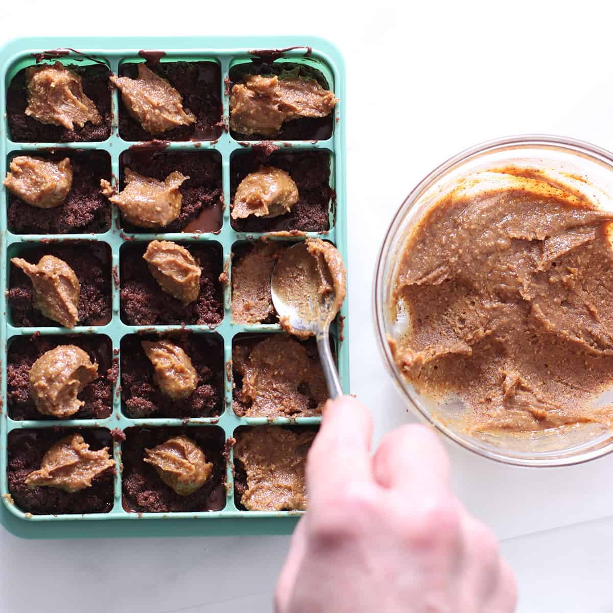 snickers brownie bites caramel in a bowl.