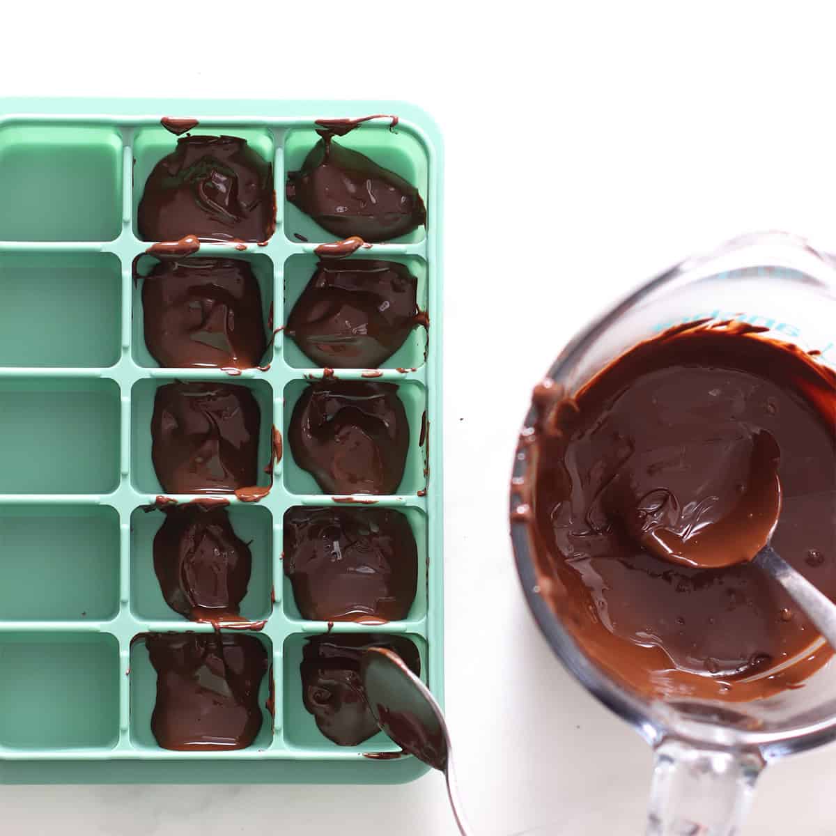 snickers brownie bites with chocolate bottom.