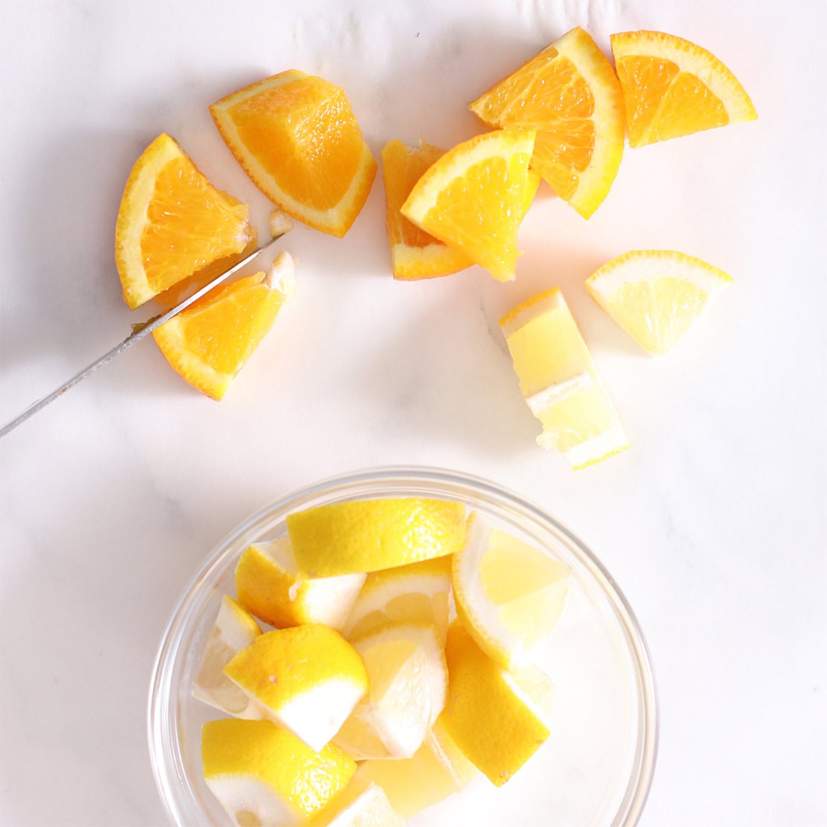 chopped oranges and lemons for immunity cubes.