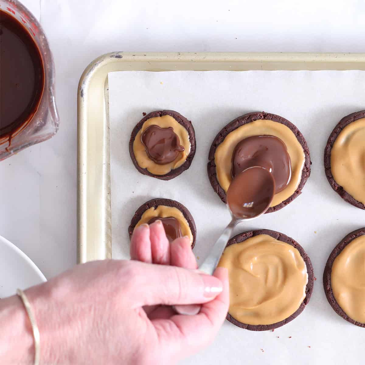 peanut butter buckeye cookies with chocolate topping.