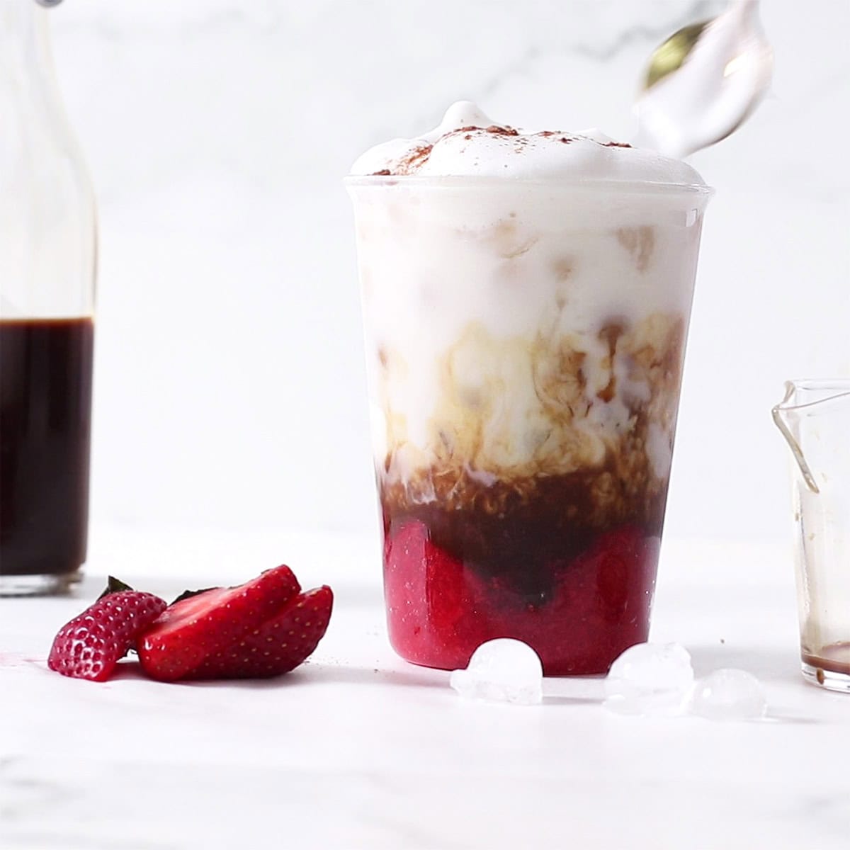 foam on strawberry latte.