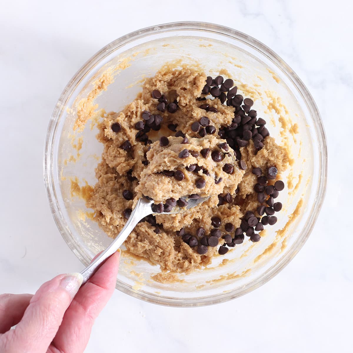 banana oat bread cookies batter with chocolate chips.