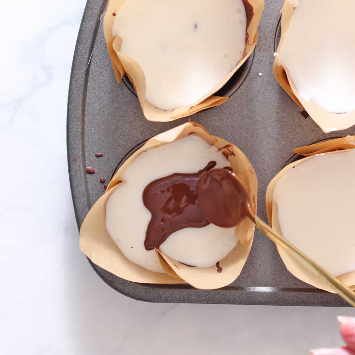 add magic shell to top of vanilla ice cream freezer cups.