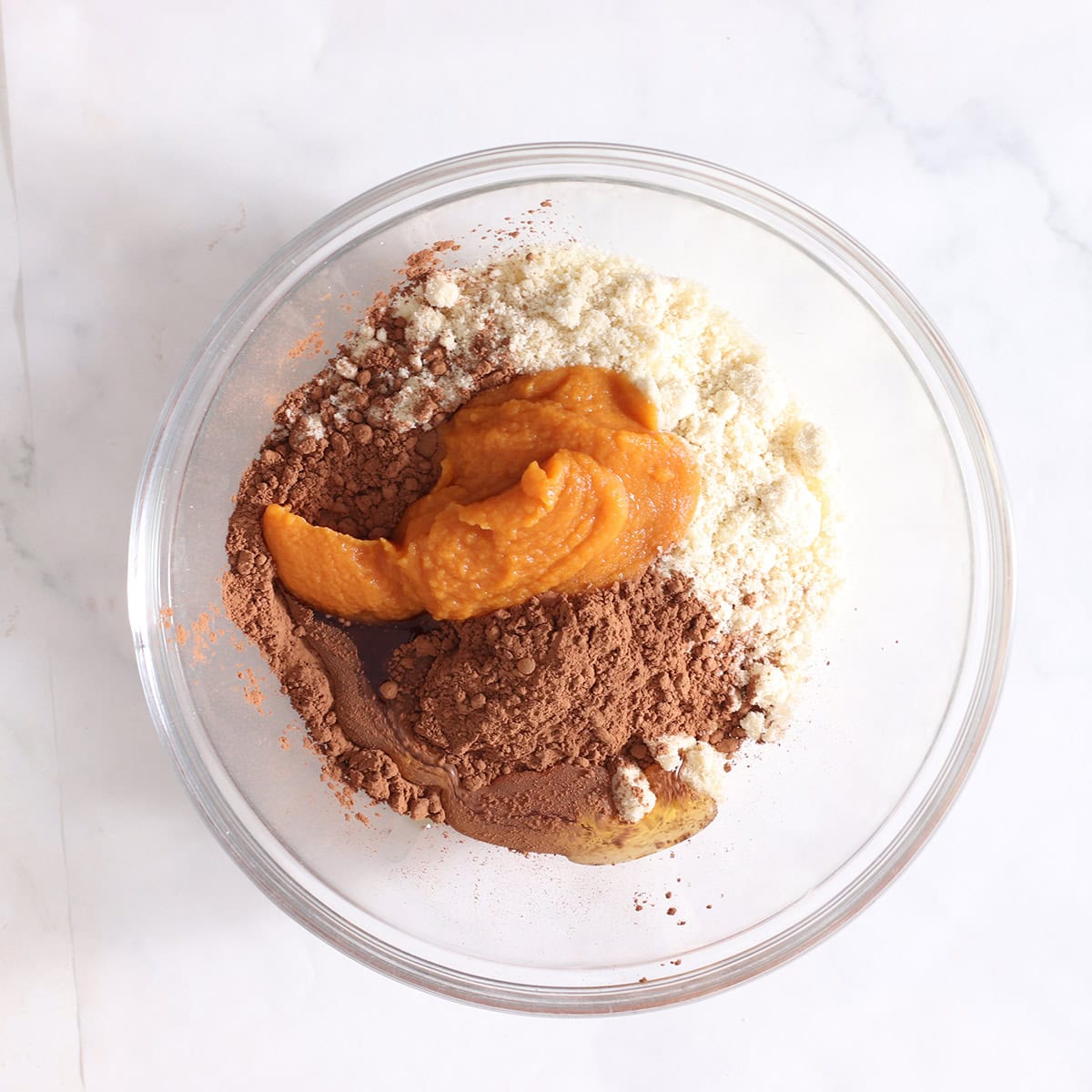 sweet potato brownie ball ingredients in a bowl.