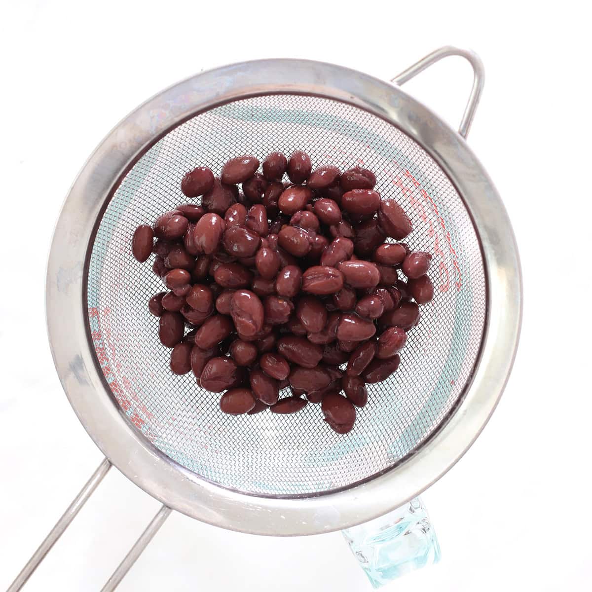 black beans in strainer.