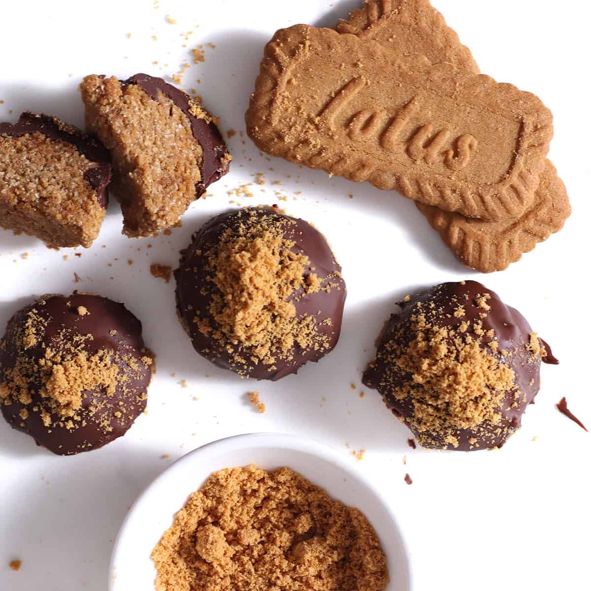 biscoff brownie balls with melted chocolate.